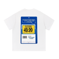 Back view of a white short-sleeve T-shirt featuring a blue Toysrus video game retail security display card labeled "Economic Collapse" with a mock store price tag, barcode, and checkout instructions.