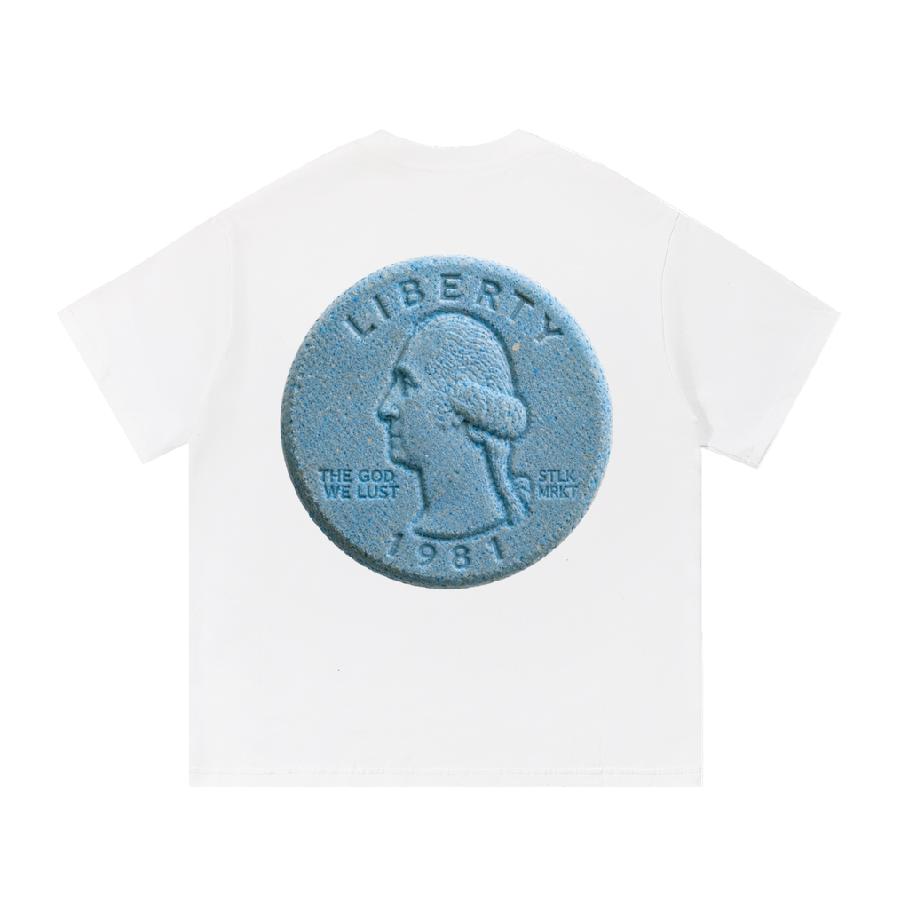Back view of a white short-sleeve T-shirt featuring a large blue tablet designed to resemble a U.S. quarter with George Washington, the words "THE GOD WE LUST," and "1981."
